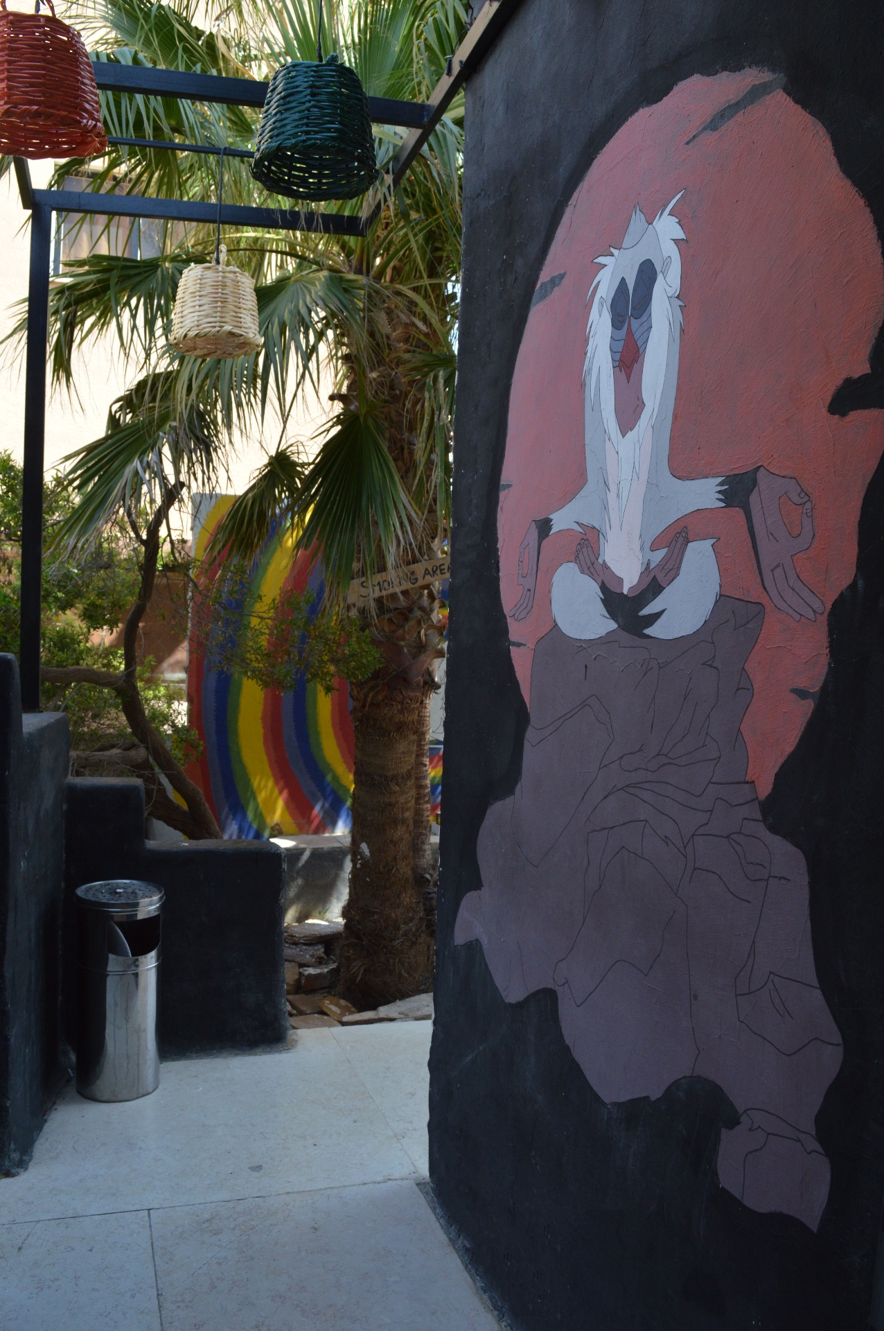 Rafiki mural from The Lion King at the entrance